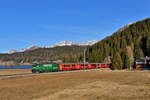 Ge 4/4 III 647 mit einem RE nach Davos Platz am 28.12.2016 bei Davos Dorf. 