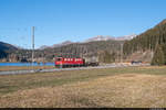 RhB Ge 6/6 II 703  St. Moritz  ist mit dem Güterzug 5047 von Landquart nach Davos unterwegs und konnte hier am 26.11.2020 kurz vor Davos Dorf aufgenommen werden.