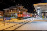 Am 18.12.2020 ist RhB Ge 6/6 II 707 und Tm 2/2 119 mit dem GZ 8974 von Pontresina nach Samedan unterwegs und konnte hier vor der Abfahrt im Bahnhof Pontresina aufgenommen werden.