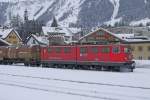 Ge 6/6 II 706 mit Kesselwagenzug in Samedan, 30.1.14.