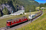 In Alvaschein fährt die Ge 6/6 II 705 mit dem Calanda Bierzug bei 31 Grad Aussentemperatur,höchst nötig für die durstigen Kehlen im Engadin,am 23.6.2016 den Berg hinauf.