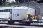 RhB - Uce 8012 am 31.05.1992 in St.Moritz - Zementsilowagen 2-achsig mit 1 offenen Plattform - Baujahr 1964 - JMR/MBA - Gewicht 7,87t - Zuladung 15,00t - LP 7,75m - zulssige Geschwindigkeit 65 km/h - 3=28.04.1986 - Logo nur RhB - Lebenslauf: ex OB1 8012 - 1969 Uce 8012 - 2004 Uc 2012. Hinweis: gescanntes Dia
