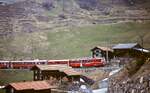 In Langwies zieht ein unbekannter ABDe 4/4 im März 1996 einen Zug hinauf nach Arosa, s. auch Bild ID 1294351