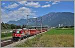 RE1745 mit Ge 4/4 II 617  Ilanz  bei Felsberg. (28.07.2020)