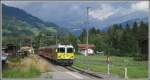 RE1350 aus St.Moritz mit der Ge 4/4 II 611  Landquart  bei der Station Seewis-Valzeine.