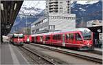 RE1232 mit Ge 4/4 II 620  Zernez  und S1 1512 mit ABe 4/16 3102 in Landquart.