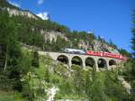 647	 Grsch  mit einem Regio Express oberhalb des Toua Tunnels am 18. August 2009.