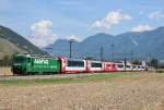 Am 26.Juli 2013 war Ge4/4 III Lok 647 der RhB mit dem Glacierexpress aus Chur zwischen Felsberg und Domat/Ems auf dem Weg Richtung Reichenau-Tamins.