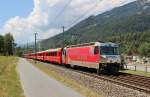 Am 26.Juli 2013 war Ge4/4 III Lok 651 der RhB mit einem Schnellzug aus Richtung Reichenau-Tamins bei Domat/Ems-Emswerk auf dem Weg nach Chur.