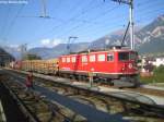 Ge 6/6'' 703 ''St. Moritz'' wartet am 22.9.09 mit einem Gterzug in Thusis.