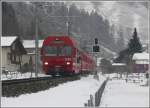 RE1040 aus Davos Platz mit Steuerwagen 1755 zwischen Grsch und Seewis-Valzeina.