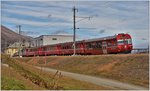 R1948 mit Ge 4/4 II 615  Klosters  und Steuerwagen 1751 zwischen Samedan und Bever.(02.11.2016)