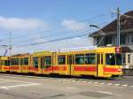 Be 4/8 209 unterwegs auf der Linie 11 am MParc, 26.09.2015