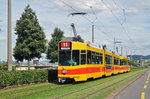 Doppeltraktion, mit dem Be 4/8 246 und dem Be 4/6 205, auf der Linie 11, fahren zur Haltestelle Münchensteinerstrasse.