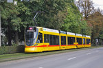 Be 6/10 Tango 153, auf der Linie 11, fährt zur Haltestelle am Bahnhof SBB.