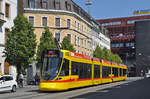 Be 6/10 Tango 160, auf der Linie 11, fährt zur Haltestelle am Bahnhof SBB.