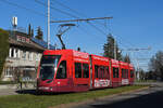 Be 4/6 Flexity 6011 mit der Werbung für die Raiffeisen Bank, auf der Linie 16, fährt am 20.02.2023 zur Endstation auf dem Bruderholz.