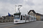 Be 6/8 Combino 319, mit einer Tissot Uhren Werbung, auf der Linie 6, überquert die Mittlere Rheinbrücke. Die Aufnahme stammt vom 08.03.2016.