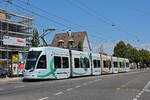 Be 6/8 Flexity 5036 mit der Swatch Werbung, auf der Linie 6, bedient am 14.06.2023 die Haltestelle Kirche in Allschwil.