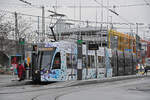 Be 6/8 Flexity 5011 mit der Werbung für Pferde Anlässe in Basel, auf der Linie 6, bedient am 08.01.2024 die Haltestelle beim badischen Bahnhof.