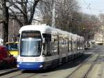 TPG Genf - Tram Be 6/8 879 unterwegs in der Stadt Genf am 18.02.2012