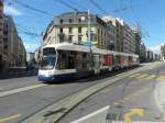TPG - Tram Be 6/8 868 mit Teilwerbung unterwegs in der Stadt Genf am 09.09.2013