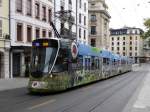 tpg - Tram Be 6/10  1812 unterwegs auf der Linie 18 in den Strassen von der Stadt Genf am 05.09.2015