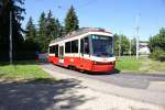 Einfahrt des Tramersatzzuges mit dem Be 4/6 73 an der Spitze am 15.8.09 in Rehalp.