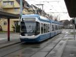 VBZ - Tram Be 5/6 3084 unterwegs auf der Linie 11 in Zrich am 23.12.2012