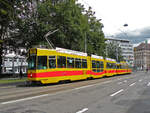Doppeltraktion, mit dem Be 4/8 243 und dem Be 4/6 114, auf der Linie 10, bedient am 08.08.2011 die Haltestelle am Aeschenplatz.