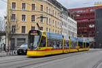 Be 6/10 Tango 163, auf der Linie 11, fährt am 12.02.2024 zur Haltestelle am Bahnhof SBB.