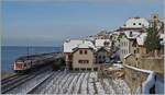 Für einmal hatte ich mein Bild eher gemacht, als Sonne den Schnee im Lavaux wegeschmelzen konnte: Ein SBB RABe 511 ist als RE bei St-Saphorin nach Genève unterwegs.