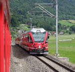 Auf der Doppelspur hinter Schiers kommt uns ABe 8/12 3510  Alberto Giacometti  als RE1248 (Davos Platz - Landquart) entgegen.