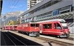 Ge 6/6 II 706  Disentis/Mustér  und S1 1516 mit ABe 4/16 3103 in Landquart. (25.10.2018)