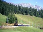 RhB Salonzug fr GRAUBNDEN TOURS 3051 von Klosters ber Filisur nach St.Moritz vom 25.08.2000 zwischen Davos-Laret und Davos-Wolfgang mit E-Lok Ge 6/6I 412 - D 4062 - AS 1143 - AS 1144 - AS 1142 - AS 1141.