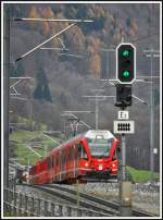 ABe 8/12 3507 mit RE 1036 aus Davos Platz fährt in Schiers ein. (28.11.2013)