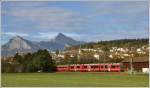 RE1041 nach Davos mit ABe 8/12 3505 bei Malans mit dem Gonzen, der Gauschla und dem Regitzer Spitz im Hintergrund. (06.11.2015)