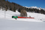 RE 1033 mit der Ge 4/4 III 647 an der Spitze fährt am 21.01.2017 von Davos Laret Richtung Davos Wolfgang.