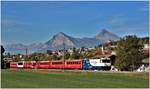 RE1045 nach Davos Platz mit Ge 4/4 III 649  Lavin  bei Malans mit Gonzen und Gauschla im Hintergrund.