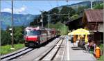 RE1037 nach Davos Platz mit Ge 4/4 III 642  Breil/Brigels  durchfhrt Saas im Prttigau ohne Halt.