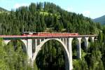 RhB - Regionalzug 1820 von Filisur nach Davos Platz am 20.07.2009 auf Wiesener Viadukt mit Steuerwagen BDt 1755 - B 2347 - B 2342 - A 1248 - E-Lok Ge 4/4III 648
