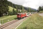 Die 603 Badus am 3/08/2012 mit ein Glacier Express im Davos Glaris.