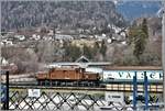 Ge 6/6 I 414 mit Valserwasserzug nach Ilanz auf der alten Hinterrheinbrücke in Reichenau-Tamins. (09.03.2018)