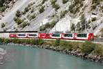 Die neu beklebte Ge 4/4 II 623  Glacier Express  mit GEX bei Trin am 19.09.2018