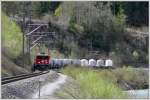 Ge 6/6 II 705  Pontresina/Puntraschigna  zieht einen leeren Zementzug von der Gotthard Basistunnel Baustelle talwrts dem Vorderrhein entlang. (17.04.2009)
