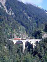 RhB Gterzug 5738 von Disentis nach Landquart vom 11.08.1992 auf Val Russein-Viadukt mit E-Lok-Oldtimer Ge 6/6I 415 - A 1254.