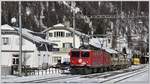 Ge 4/4 I 603  Badus  und 602  Bernina  sind mit Aushub aus dem Albulatunnel II in Bever unterwegs nach Samedan.