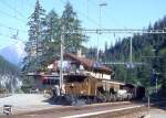 RhB Gterzug 5315 von Landquart nach Pontresina am 08.06.1993 in Bergn mit E-Lok-Oldtimer Ge 6/6I 411 - Fd 8655 - Fd 8652 - Kkw 7367 - Kkw 7326 - Gb 5074 - Gbkv 5528.