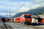 RhB Dienst-EXTRAZUG fr RHTIA INCOMING 9217 von Samedan nach Zuoz am 11.09.1994 in Samedan mit E-Lok Ge 4/4III 644 - B 2391 - WRS 3821 - B 2393. Hinweis: EW-IV-Zug mit den neuesten Einheits-Stammnetzwagen Typ 4.
