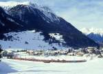 RhB Schnellzug 550 von St.Moritz nach Chur am 02.02.1998 bei Bergn mit E-Lok Ge 4/4 III 649 - B 2265 - WR 3810 - 2x A - 3x B - D 4220 - Skl 84x. Hinweis: gescanntes Dia
